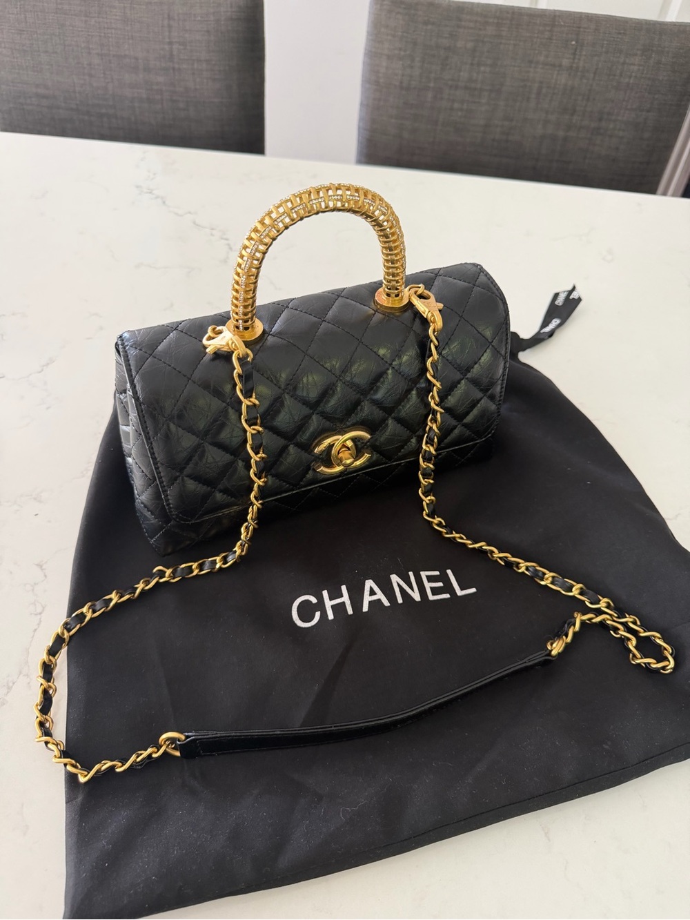Black Quilted Leather Top-Handle Satchel with Gold Hardware